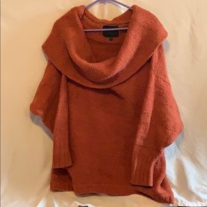 Women’s orange turtleneck sweater